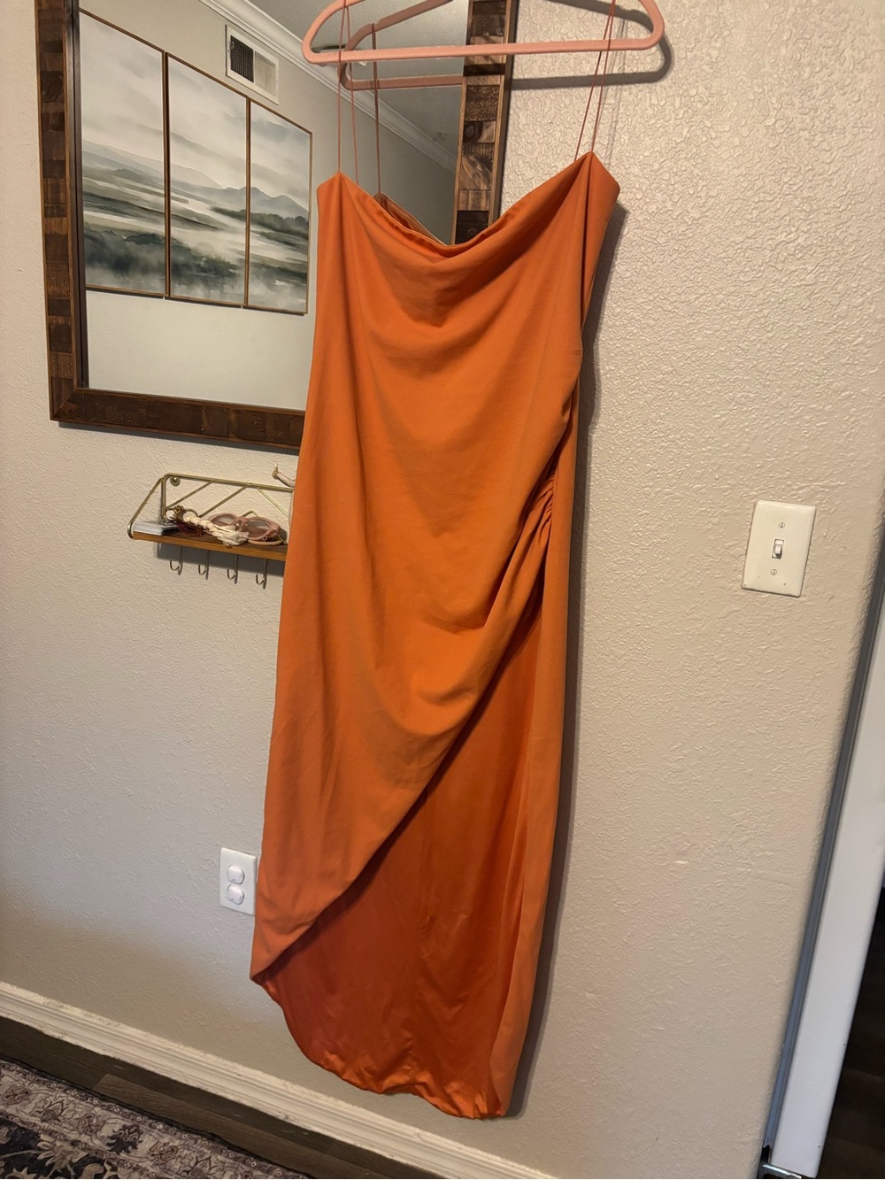 Orange evening gown with high slit